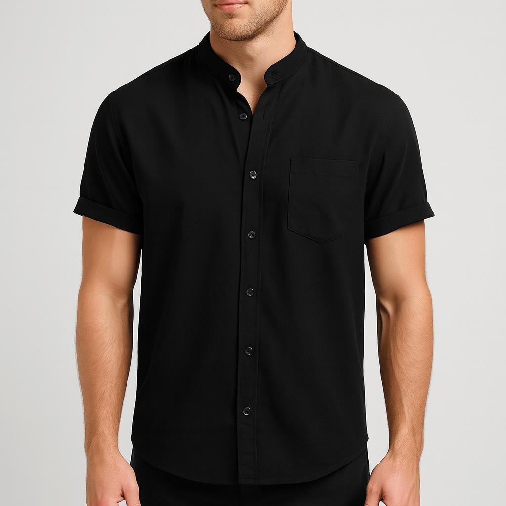 Koszulka polo z kołnierzykiem typu stójka, podwiniętymi mankietami i kieszenią