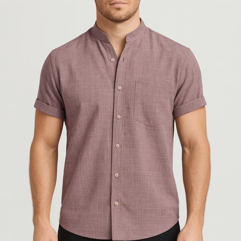 Koszulka polo z kołnierzykiem typu stójka, podwiniętymi mankietami i kieszenią