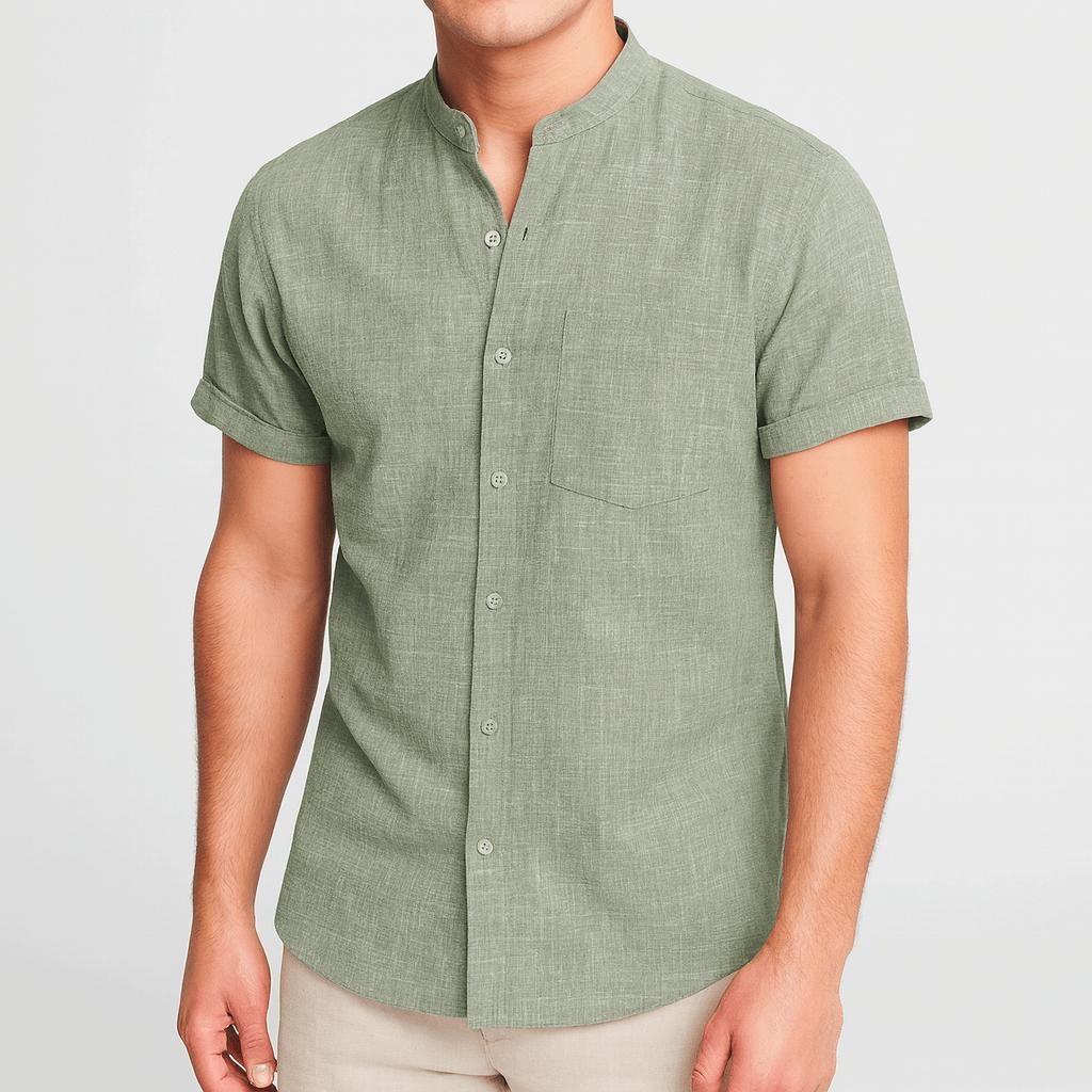 Koszulka polo z kołnierzykiem typu stójka, podwiniętymi mankietami i kieszenią